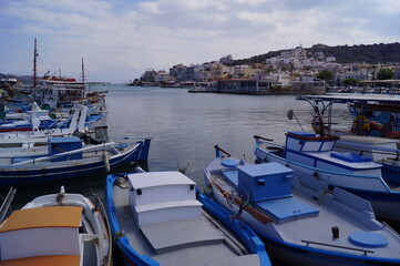 Boats at the dock in the port of Elounda, Crete (Greece)