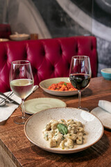 beautiful table with gnocchi at an Italian restaurant