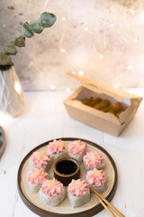 Sushi roll with pink cream, salmon