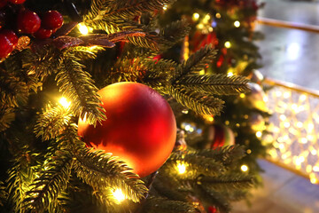 Christmas tree with new year decorations. New Year celebration. Selective soft focus. Background for postcards