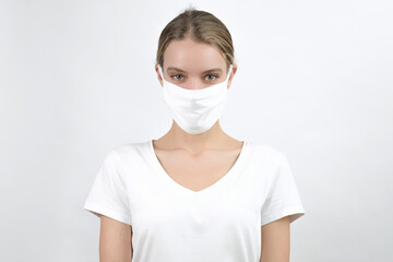 Young beautiful white woman wearing face mask, health protection in prevention for coronavirus, covid-19