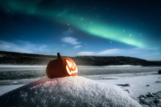 Halloween pumpkin and northern lights