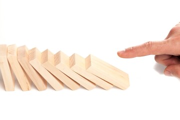 Hand Pushing Domino Pieces