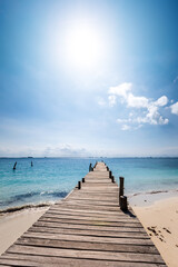 Wooden pier on tropical beach. Travel destinations