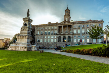 A view across the garden with the statue of  Henry the Navigator in Porto, Portugal on a sunny afternoon