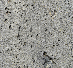 Texture and background for the material. Unique pattern of gray cement texture in the pimples of the wall.