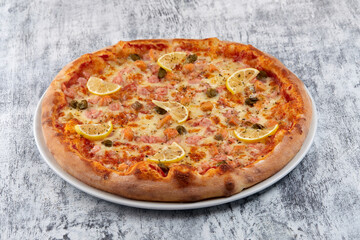 fresh pizza on the white plate
