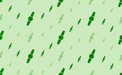 Seamless pattern of large and small green wristwatch symbols. The elements are arranged in a wavy. Vector illustration on light green background