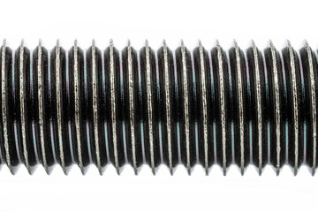 A background made of a macro shot of a black HF bolt thread with a hardness of 4.8, isolated on a...