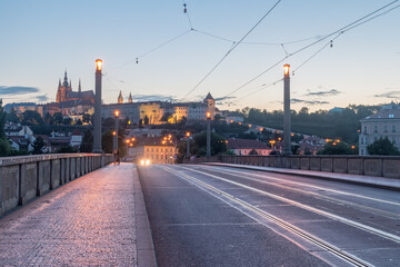 Sunset view on Manes Bridge in Prague, Czech Republic.