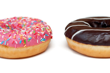Sweet pink and chocolate donuts on white background
