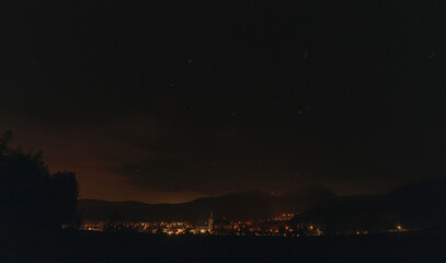 Stars and lights from Hejnice town in Jizerske hory mountains