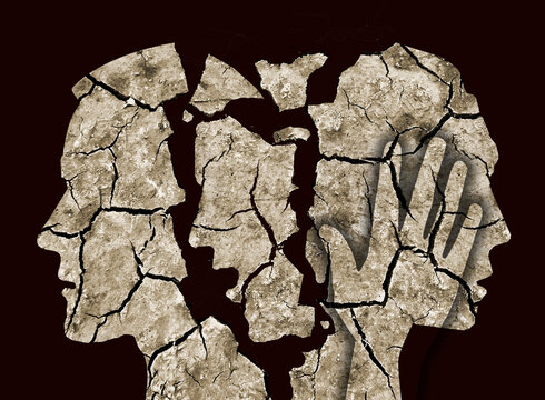 Schizophrenia, depression male head silhouettes.
Male head silhouettes. Photo-montage with Dry cracked earth.The image does not show real people. Concept psychiatric problems.