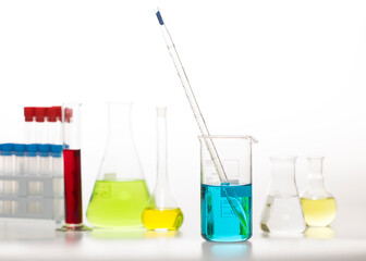 Test-tubes on a white background with copy space