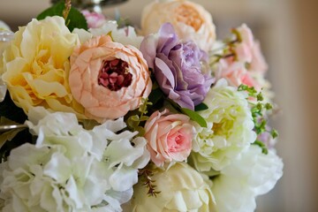 The composition is made by florists from fresh flowers.