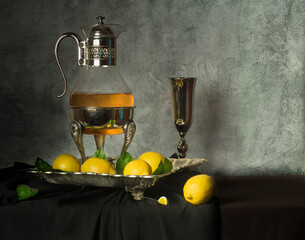 Still life, lemons, greens, leaves, jug, dishes, food, yellow, glass, tray, cloth, black