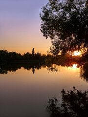 Fototapeta na wymiar Sunset at lake in autumn.