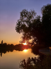 Sunset at lake in autumn.