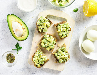 Avocado eggs salad on bread