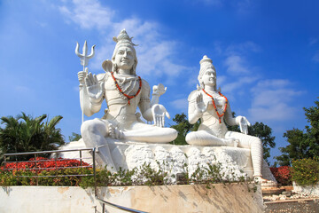 Hindu god and goddess lord Shiva and Parvathi statues on Kailasagiri hill in Andhra Pradesh state India