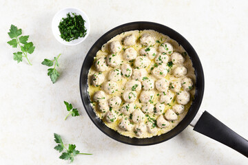 Swedish meatballs with white creamy sauce
