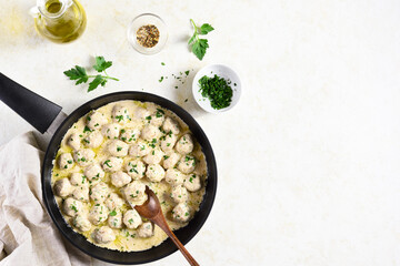 Swedish meatballs with white creamy sauce