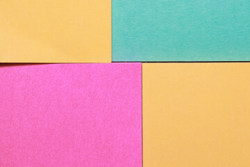 Four sticky notes formed colorful background
