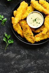Crispy fried breaded chicken breast strips