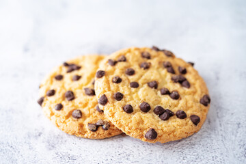 Cookies with chocolate drops on a background