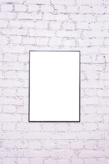 Frame on white brick wall, background with copy space, vertical
