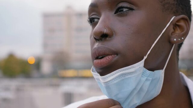 Work In The Hospital During Covid - Doctor Pulls Down Her Mask Outdoor