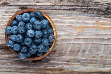 blueberries in a wooden plate