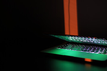 half opened computer on desk