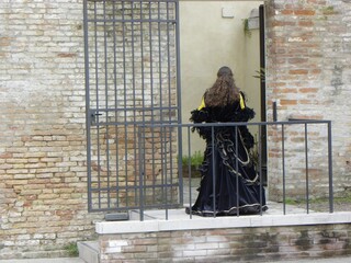 Venetian carnival, costume, person in prison window