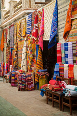 carpets for sale on the streets of the Medina, the photo was taken in Essaouira in Morocco