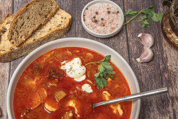 Hungarian traditional goulash, bableves close up. Top view. 