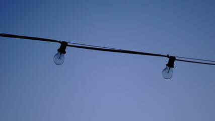 light bulb against sunset background