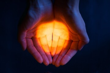 A Light in Cupped Hands