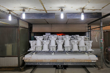 Ceramic toilet mud tires are fired at high temperature in a kiln in a factory, China.