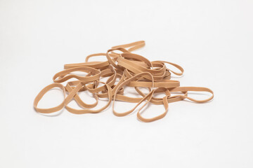 Rubber Bands Lying In A Pile On A White Backdrop