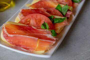 Spanish Food fresh tomatoes and serrano ham