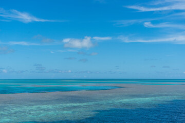 blue sky and sea with coral reef