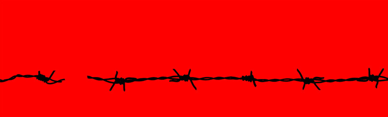  Rusty barbed wire isolated on a red background