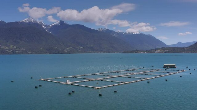 Aerial salmon farms at Reloncavi marine strait at Llanquihue National Park, Chile, South America.
