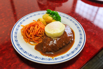 Hamberg steak with egg and spaghetti, popular food, selective focus