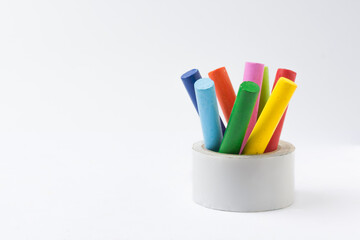 Set of Multicolored Oil Pastel Crayons on white background
