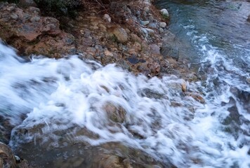 water flowing over rocks