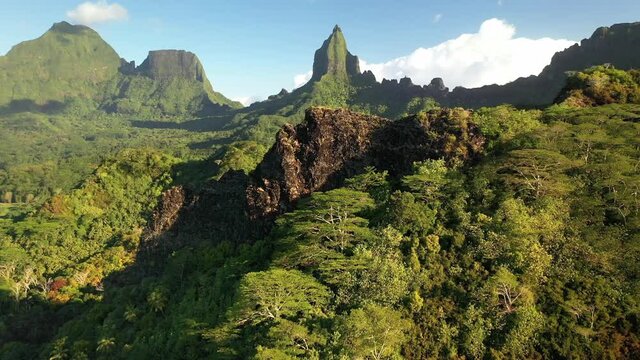 Drone aerial view Tahiti : Mount Rotui, Moorea, French Polynesia. mountain nature. Exotic travel vacation, paradise getaway, honeymoon destination.  