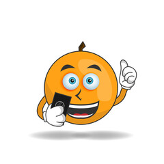 Orange mascot character holding a cellphone. vector illustration