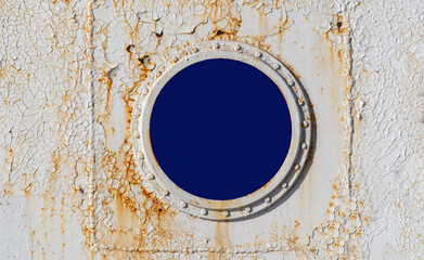 porthole on an old ship. window frame on a steamer. layout for inserting an image
